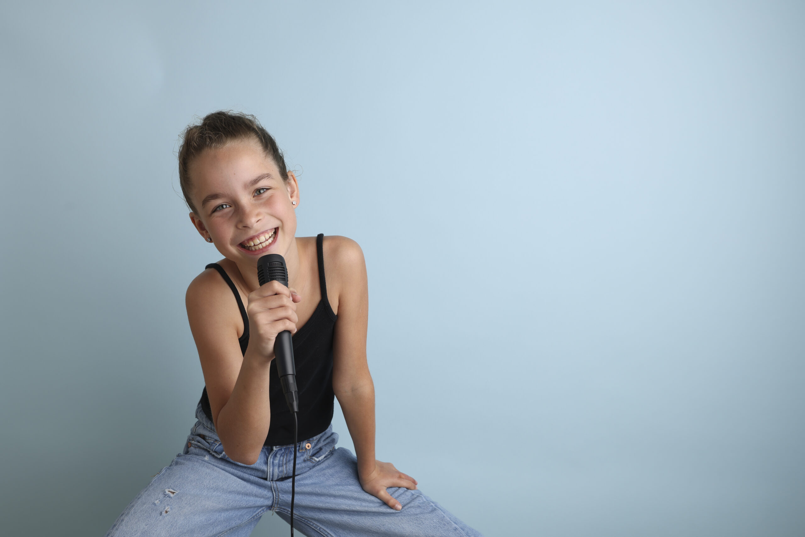 Student singing during a voice lesson